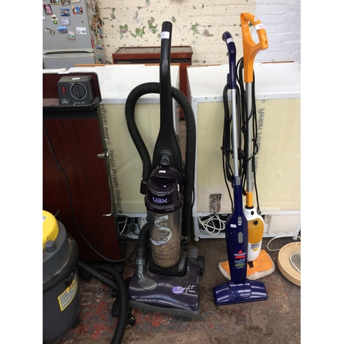 226 - A PURPLE AND GREY VAX UPRIGHT BAGLESS VACUUM CLEANER (W/O)