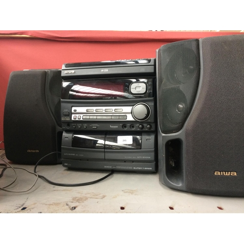 245 - AN AIWA (NSX V800) STEREO SYSTEM COMPRISING OF TAPE DECK, TUNER AMP, THREE DISC CD PLAYER AND TWO MA... 