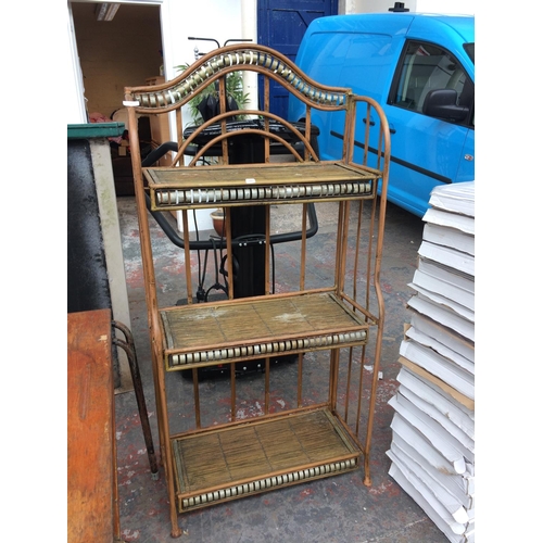 28 - A BROWN PAINTED METAL ORNATE CONSERVATORY UNIT WITH THREE SHELVES