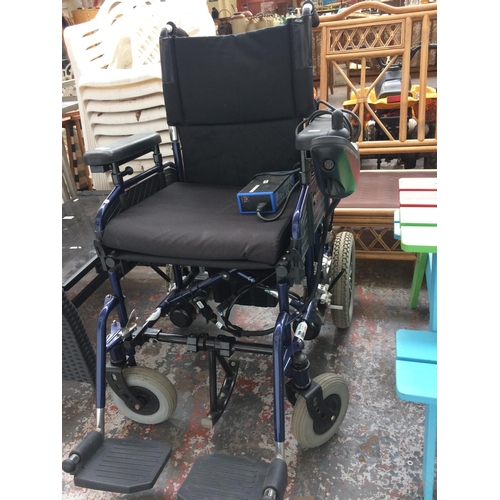 41 - A BLUE AND BLACK KOMFI-RIDER ELECTRIC WHEELCHAIR WITH BATTERY AND CHARGER