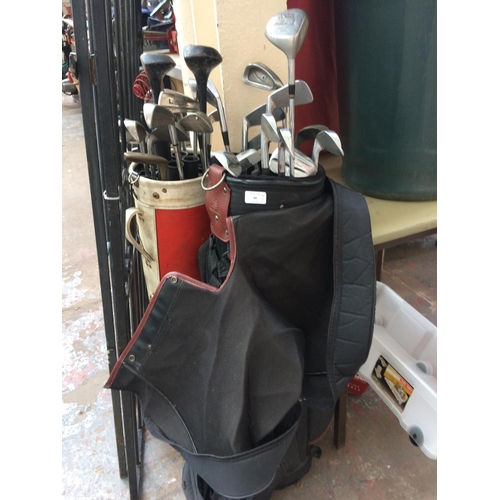 48 - TWO GOLF BAGS CONTAINING TAILOR MADE, PING AND WILSON GOLF CLUBS