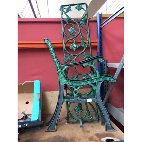 53 - THREE ITEMS TO INCLUDE A PAIR OF CAST IRON ORNATE GARDEN BENCH ENDS AND BACK