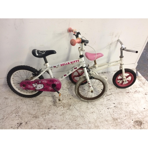 7 - TWO SMALL CHILDRENS BIKES, ONE PINK AND WHITE 'HELLO KITTY' BMX AND ONE WHITE BALANCE BIKE