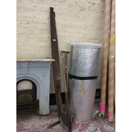 98 - FOUR ITEMS TO INCLUDE A VINTAGE 2 MAN TREE SAW, PEAT CUTTER AND SPADE AND A WOODEN SET SQUARE