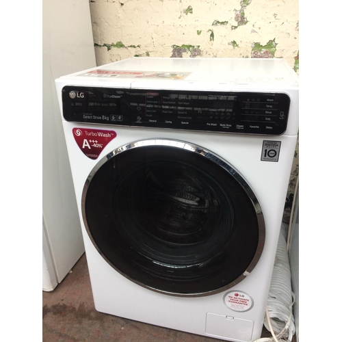 108 - A BLACK AND WHITE LG TRUESTEAM DIRECT DRIVE 8KG WASHING MACHINE (W/O)