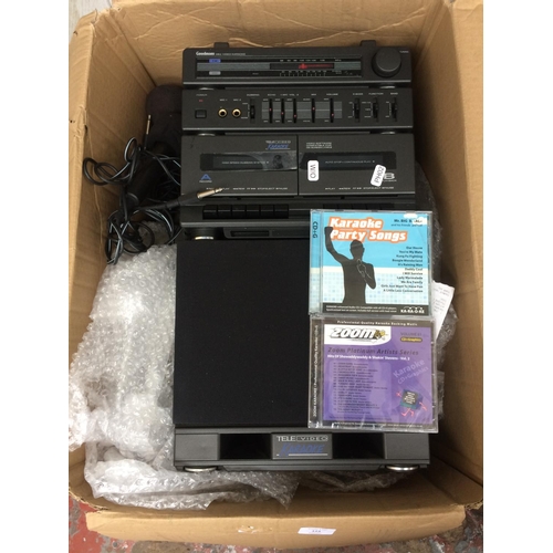 123 - A GOODMANS XB11 VIDEO KARAOKE MACHINE WITH TWO MICROPHONES AND KARAOKE PARTY SONGS (W/O)