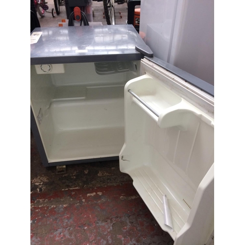 131 - A GREY DAEWOO WORK TOP FRIDGE (W/O)