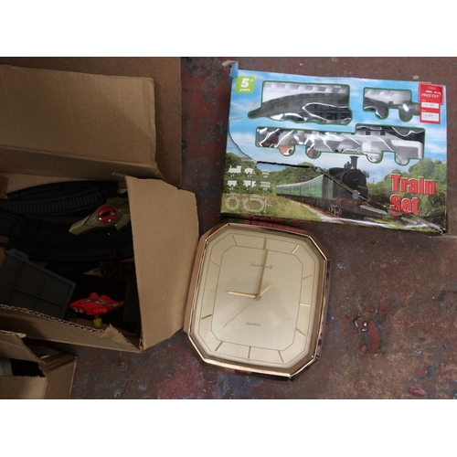 201 - FIVE BOXES AND A SUITCASE CONTAINING TOYS, CLOCKS, TRAIN SET, CLOTHING ETC