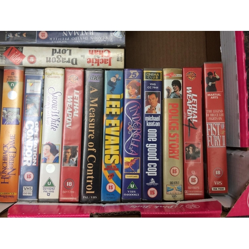 213 - A COLLECTION OF ASSORTED DVDS AND VIDEOS