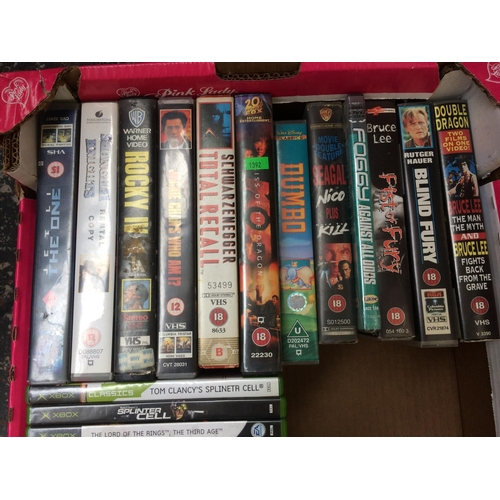 213 - A COLLECTION OF ASSORTED DVDS AND VIDEOS