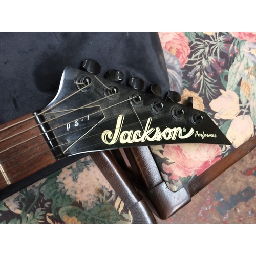 226 - A JACKSON PERFORMER ELECTRIC GUITAR WITH CASE (W/O)