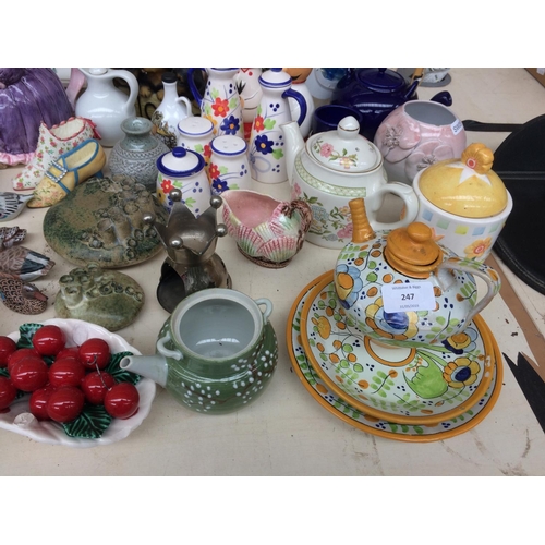 247 - A LARGE COLLECTION OF CERAMICS AND GLASSWARE TO INCLUDE ORNAMENTS, CRUET SET, COLLECTABLE TEAPOT ETC