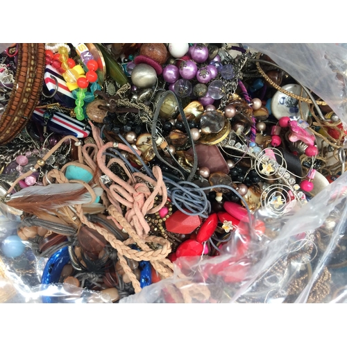 279 - A LARGE QUANTITY OF BAGGED COSTUME JEWELLERY