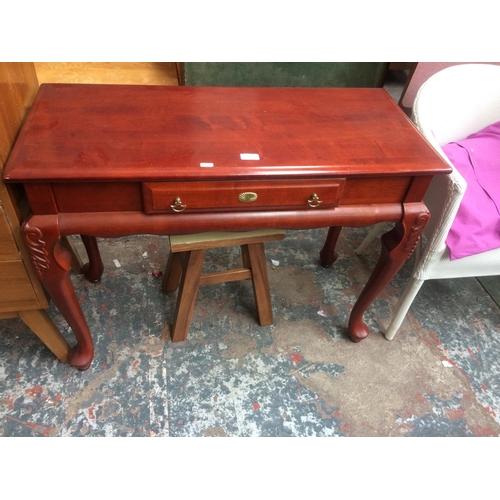 338 - FOUR ITEMS TO INCLUDE A LLOYD LOOM STYLE CHAIR, SMALL STOOL, MAHOGANY DESK AND A MIRROR