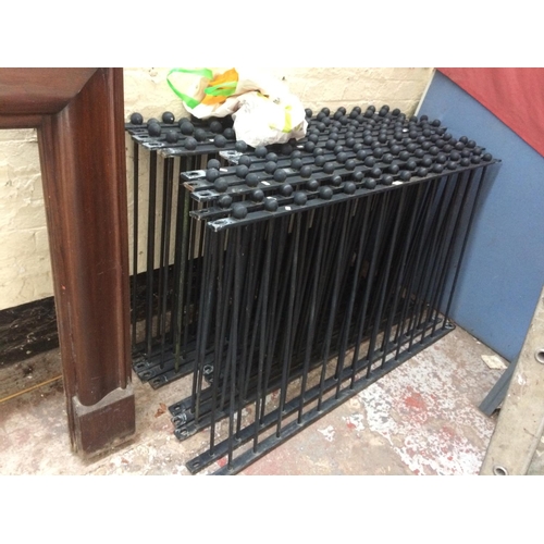 61 - TWELVE GOOD QUALITY HEAVY DUTY BLACK METAL RAILINGS MEASURING APPROX 58