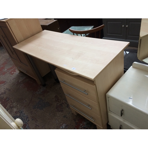 334 - AN ASH OFFICE DESK WITH THREE DRAWERS AND A MATCHING OFFICE CABINET