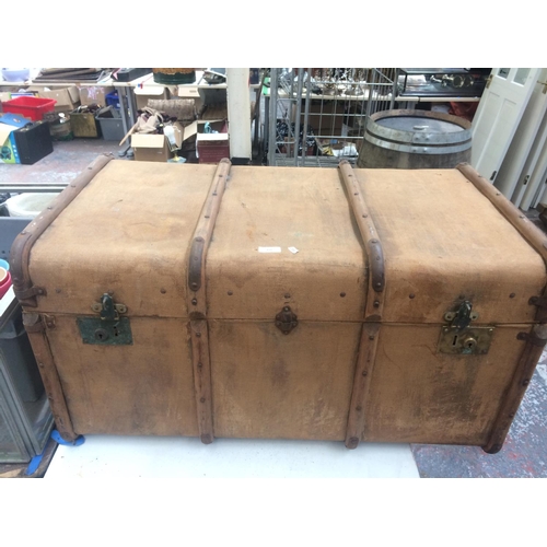 118 - LARGE GOOD QUALITY CANVAS TRAVEL TRUNK