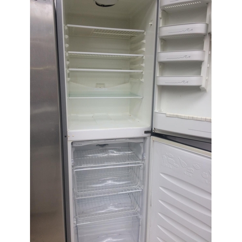 156 - LARGE GREY BEKO UPRIGHT FRIDGE FREEZER