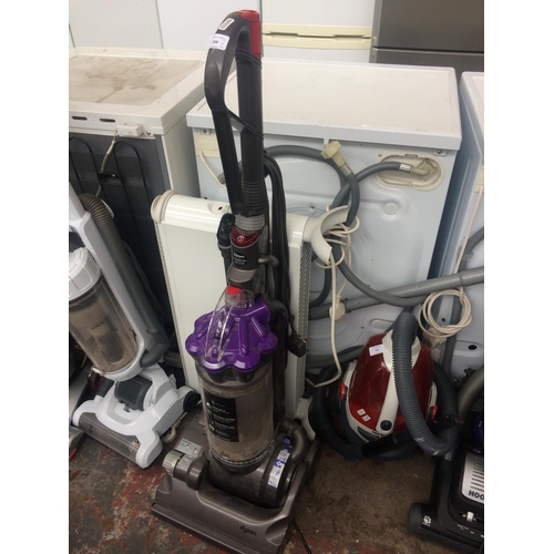 200 - TWO ITEMS: PURPLE AND GREY DYSON DC33 UPRIGHT BAGLESS VACUUM CLEANER, DIMPLEX ELECTRIC HEATER