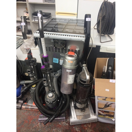 204 - THREE VARIOUS VACUUM CLEANERS FOR SPARES OR REPAIRS - TWO VAX UPRIGHT BAGLESS AND HOOVER UPRIGHT BAG... 