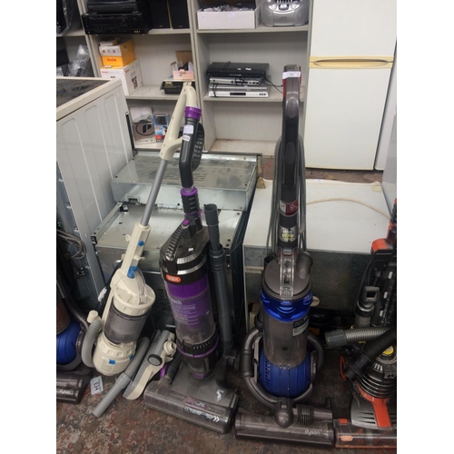 205 - THREE VACUUM CLEANERS - BLUE AND GREY DYSON SC25 UPRIGHT BAGLESS VACUUM CLEANER WITH BALL TECHNOLOGY... 