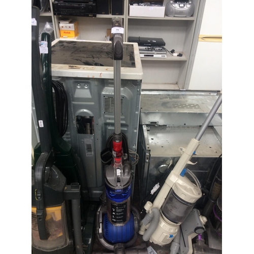 206 - A BLUE AND GREY DYSON DC24 UPRIGHT BAGLESS VACUUM CLEANER WITH BALL TECHNOLOGY (W/O)