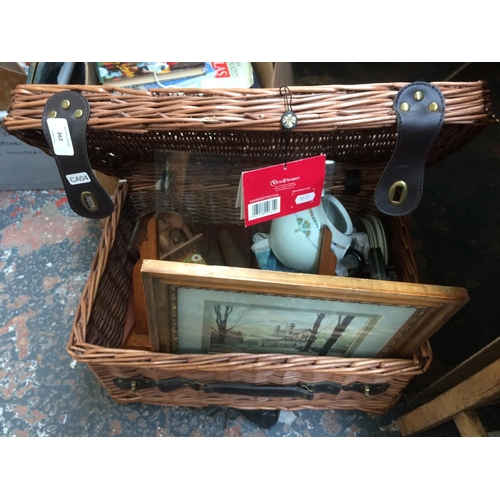 362 - VINTAGE WICKER PICNIC BASKET CONTAINING MIXED ITEMS TO INCLUDE: VINTAGE CUCKOO CLOCK, ART DECO PICTU... 