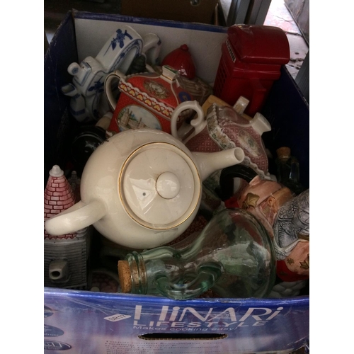 385 - TWO BOXES CONTAINING MIXED ITEMS TO INCLUDE: TEAPOTS, TIFFANY STYLE LAMPSHADE, GLASS BOTTLES, ETC