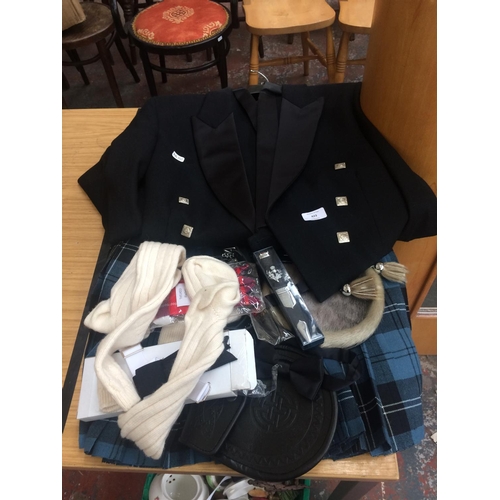 423 - MODERN SCOTTISH BLUE KILT WITH BLACK BLAZER AND VARIOUS AS NEW ACCESSORIES