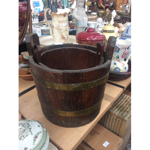 458 - TWO VINTAGE OAK AND BRASS BOUND PLANTERS