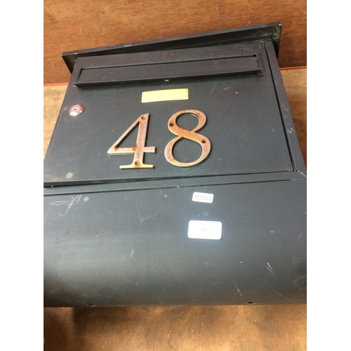 47 - A BLACK METAL POST BOX