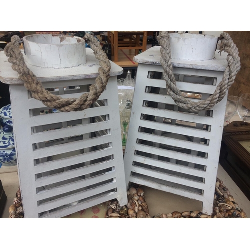 490 - NINE PICTURE FRAMES WITH SHELL BORDERS AND PAIR OF NAUTICAL STYLE GARDEN CANDLE LANTERNS