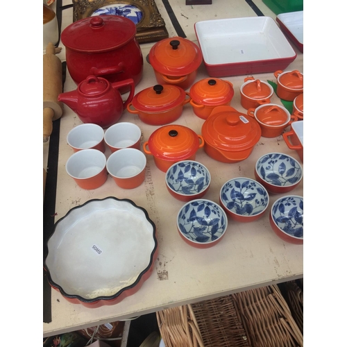 492 - 33 PIECES OF MIXED CHINA TO INCLUDE LE CREUSET STYLE TUREENS, TEAPOT, STACKING BOWLS, ETC.