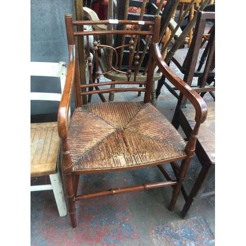 809 - AN ANTIQUE STYLE MAHOGANY FRAMED CARVER WITH RUSH SEAT