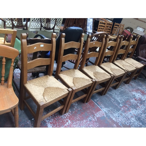 813 - A SET OF SIX GOOD QUALITY MODERN OAK FRAMED FARMHOUSE DINING CHAIRS WITH RUSH SEATS