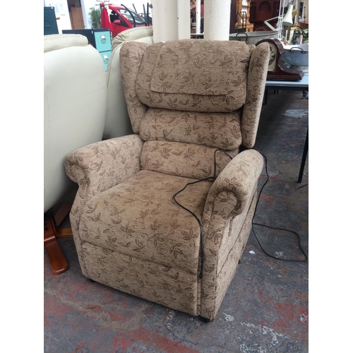 819 - A BROWN FLORAL UPHOLSTERED ELECTRIC RECLINING ARMCHAIR