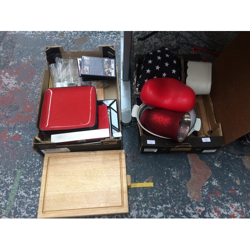 368 - TWO BOXES OF MIXED ITEMS TO INCLUDE VASE, CUTLERY, PLATES, DVD'S ETC.