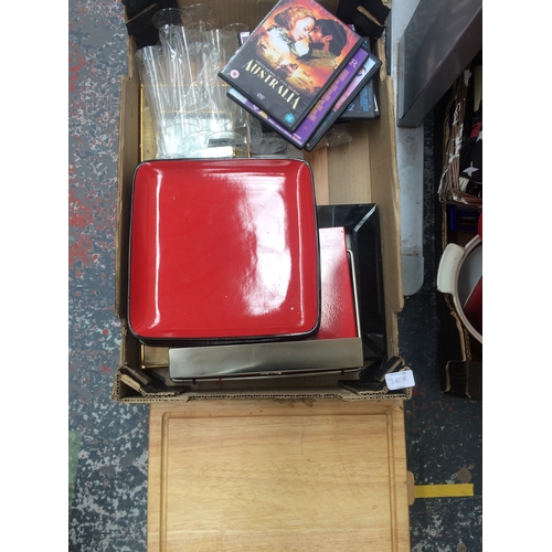 368 - TWO BOXES OF MIXED ITEMS TO INCLUDE VASE, CUTLERY, PLATES, DVD'S ETC.