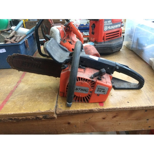 104 - A BLACK AND ORANGE STIHL 015AV PETROL CHAINSAW WITH 11