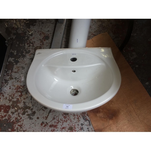 128 - AN IDEAL STANDARD WHITE PORCELAIN PEDESTAL WASH BASIN