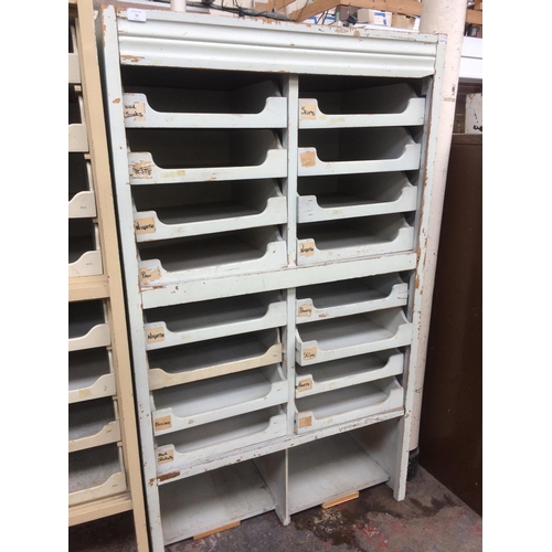 13 - A VINTAGE BEIGE HABERDASHERY CABINET WITH 16 DRAWERS