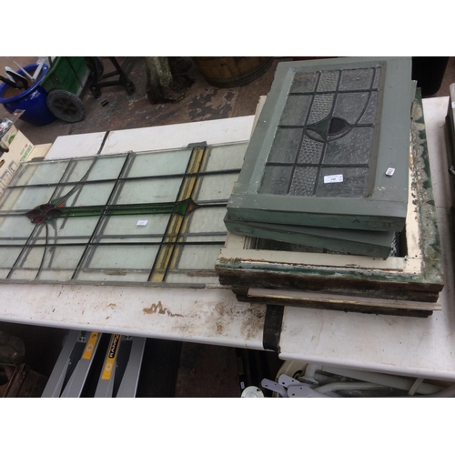 148 - SIX LEADED STAINED GLASS WINDOWS TO INCLUDE FOUR FRAMED