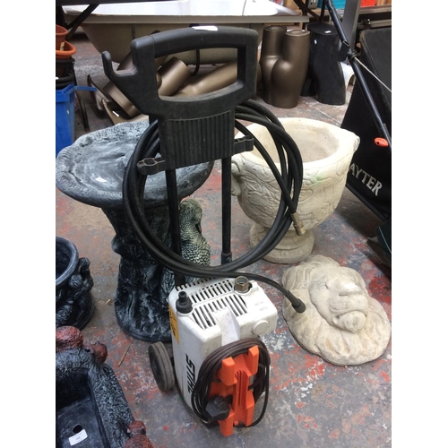 164 - AN ORANGE AND GREY STIHL ELECTRIC PRESSURE WASHER WITH HOSE (W/O, REQUIRES HOSE)