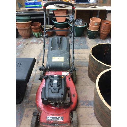 171 - A BLACK AND RED MOUNTFIELD RM45 PETROL LAWN MOWER WITH GRASS COLLECTOR (W/O)