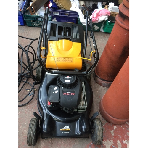 176 - A YELLOW AND BLACK MCCULLOCH SPRINT XC40 PETROL LAWN MOWER WITH GRASS COLLECTOR (W/O - FULLY SERVICE... 