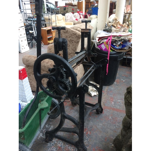 181 - A VINTAGE HEAVY CAST IRON MANGLE BASE