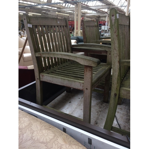 20 - A WOODEN TWO SEAT GARDEN CHAIR SET WITH CENTRAL TABLE