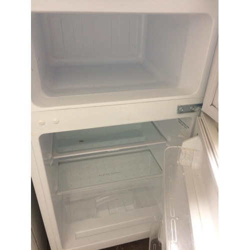 219 - AN ARGOS VALUE RANGE SMALL UPRIGHT FRIDGE FREEZER (W/O)