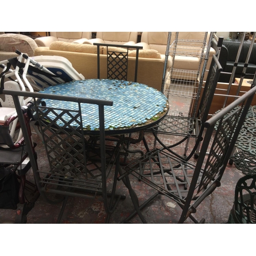 24 - A CIRCULAR TILE TOPPED CONSERVATORY TABLE ON METAL SUPPORTS WITH FOUR MATCHING CHAIRS