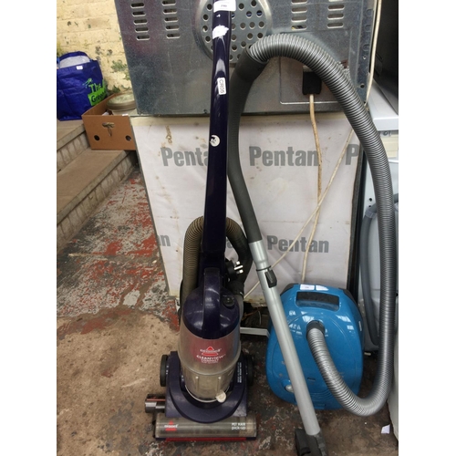 240 - A BLUE BISSELL UPRIGHT CYLINDER BAGLESS VACUUM CLEANER